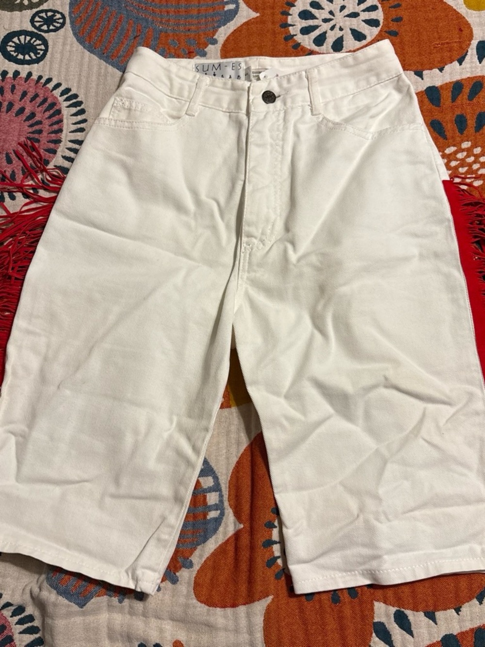 Sum-ES Los Angeles White denim jorts with bright red leather fringe